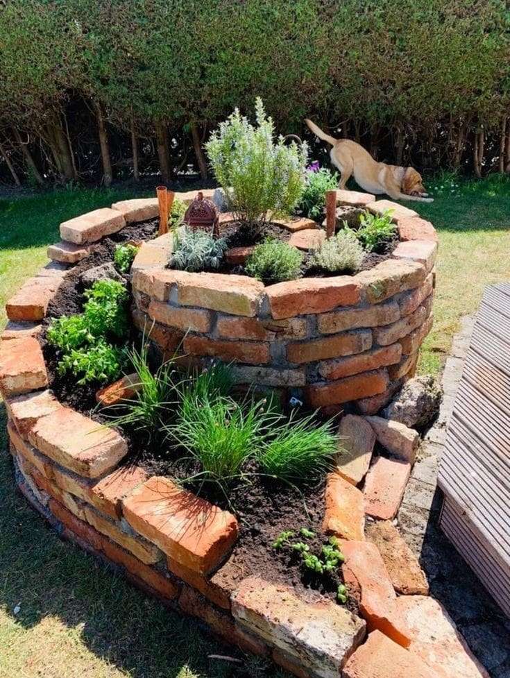 spiral herbal garden made from red brick
