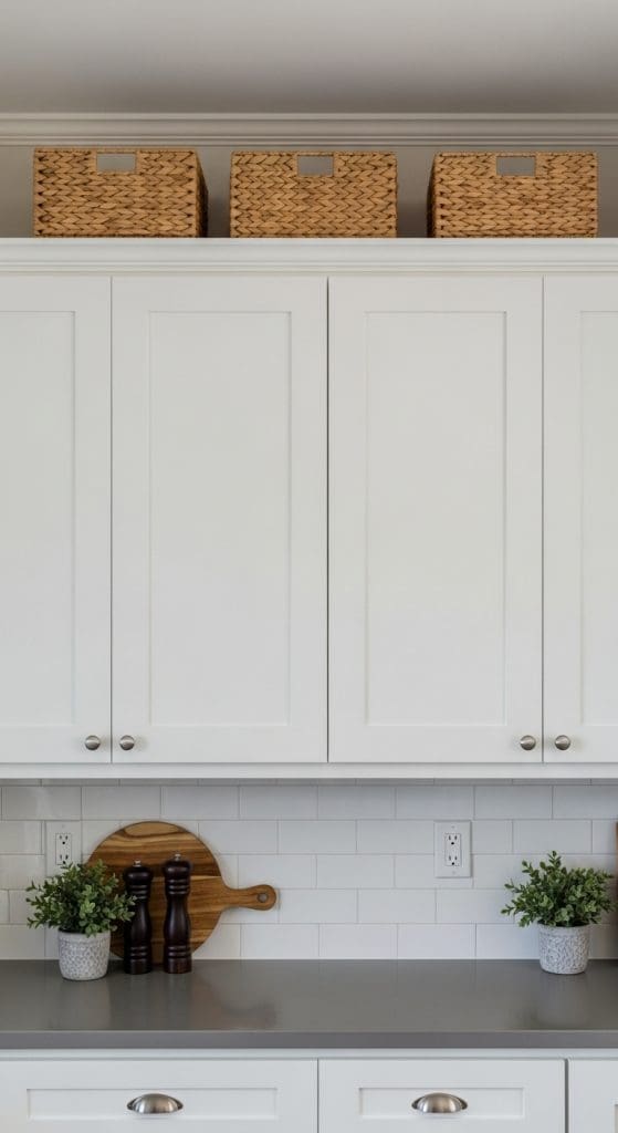 Style the Space Above Kitchen Cabinets rattan boxes