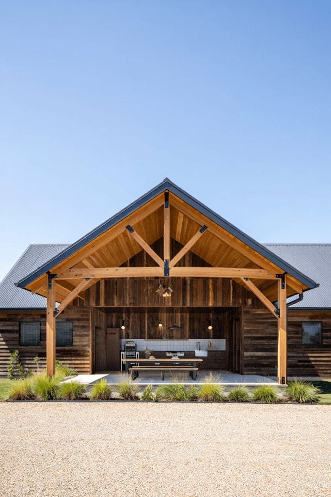covered outdoor kitchen with old reclaimed wood
