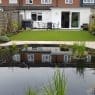 We have curated a list of 25 unique pond ideas for small gardens. These ideas will transform your small garden into a tranquil haven