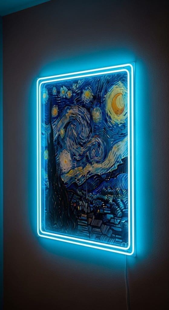 neon blue light around a starry night picture on a wall