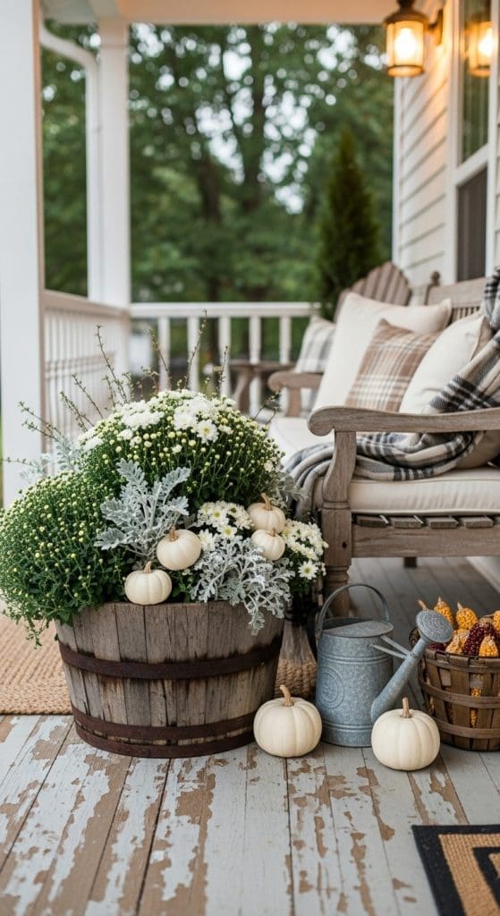 Monochrome style planter with white flowers and mini pumpkins