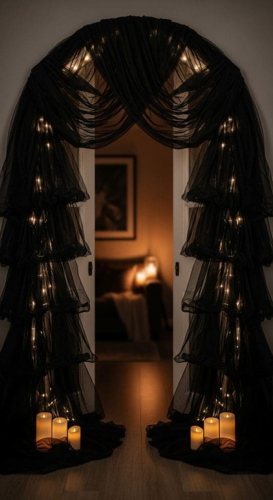 Black tulle taped to an indoor archway with faux LED candles