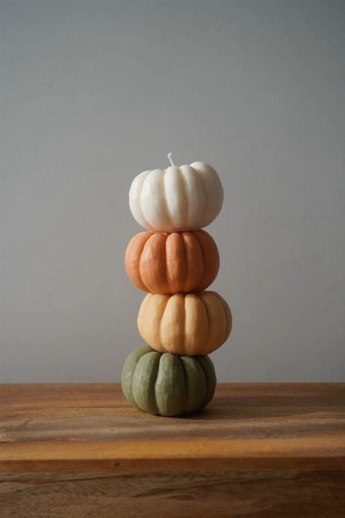 mini pumpkin fall candles in different colors
